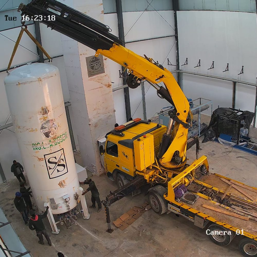 Crane installing cryogenic oxygen storage tank at SAH Oxygen facility